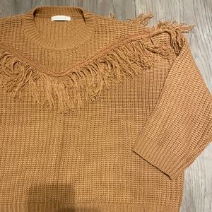 Light brown sweater with fringe detaling